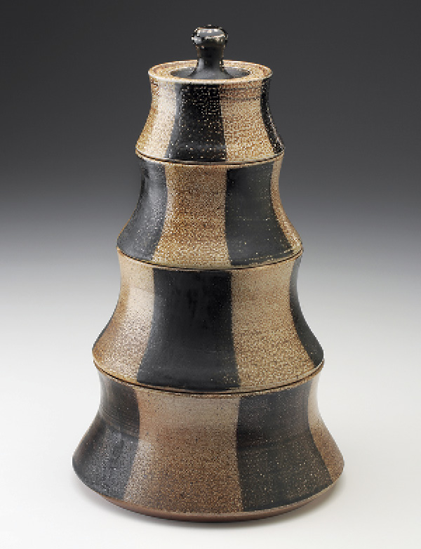 2 Maya Machin’s stacking canister set (four sections), 14 in. (36 cm) in height, white stoneware, Val Cushing Black Slip, salt glazed and wood fired to cone 10, 2020.