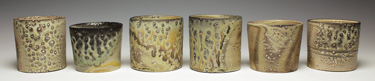 6 Rocks cups, to 4 in. (10 cm) in height, white stoneware, fired to cone 10 in a soda kiln, 2023.