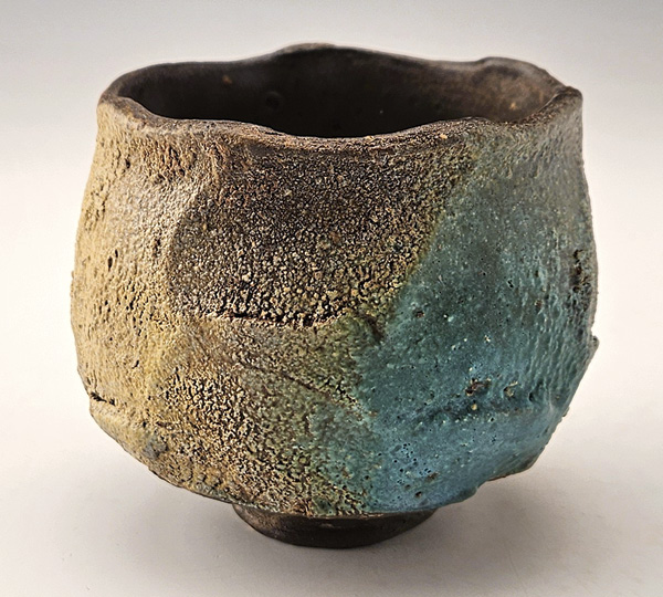 6 Turquoise Blush Yunomi, 4 in. (10 cm) in diameter, mid-fired black clay, wheel thrown, faceted, sprinkled with ball clay, Cedar Heights Redart clay, sandstone at wet stage then stretched from inside, sprayed with multiple glazes and ash, fired in oxidation to cone 6, 2023.