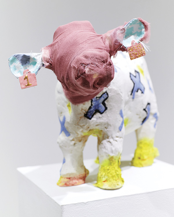 2 Laura Dirksen’s Baby Jabber, 24 in. (61 cm) in height, handbuilt stoneware, slip, Hamada glaze, fired in oxidation to cone 6, luster, fired to cone 018, fabric, yarn, paint pulp, livestock bandaging, breeding markers, 2023.