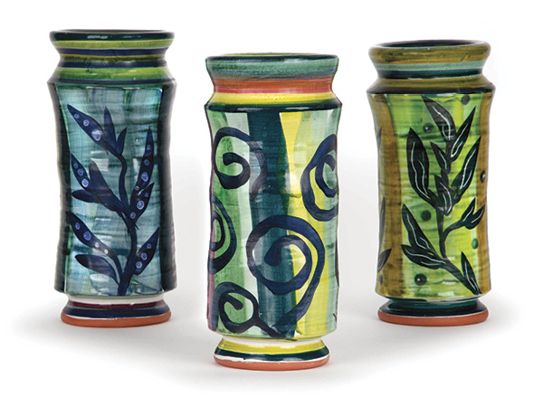 1 Stanley Mace Anderson’s Albarelli (Group of Three Vases), 10 in. (25.4 cm) in height (each), majolica-painted earthenware, 2024. Photo: Kathryn Gremley.