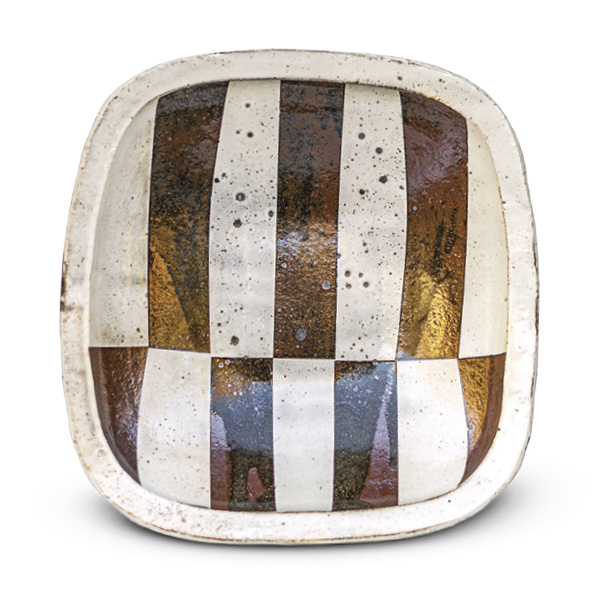 Gillan Doty’s serving tray, 10½ in. (26.7 cm) in height, handbuilt North Carolina stoneware, white slip, clear glaze, fired in reduction to cone 10 in a gas kiln, 2024.