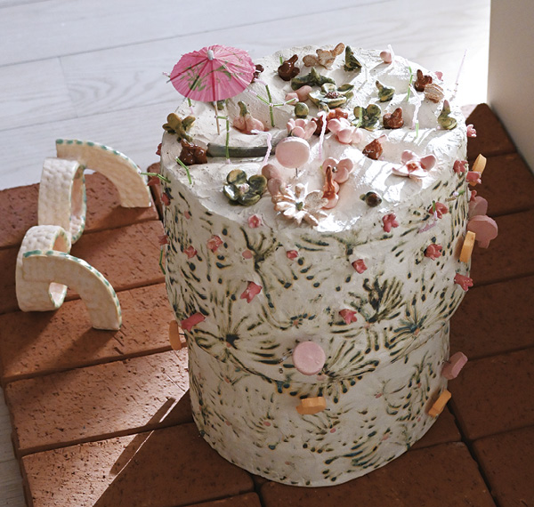 11 Planet Cake, 17¾ in. (45 cm) in height, stoneware, colored slip, glaze, 2024.