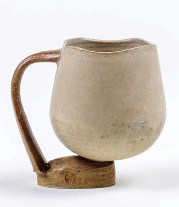 2 Amy Sanders’ balance mug, 5 in. (12.7 cm) in height, Sanders Mid-Range Orange Stoneware, glaze, fired in oxidation to cone 6, 2025.