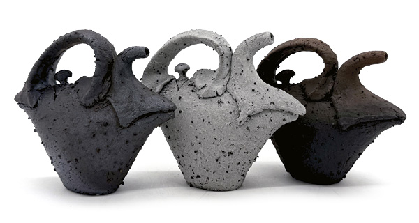 Sam McCall’s Trio of Ewers, to 12 in. (30.5 cm) in length, handbuilt and wheel-thrown iron-rich stoneware, fired to cone 9 in a gas kiln, cooled in reduction, 2026.