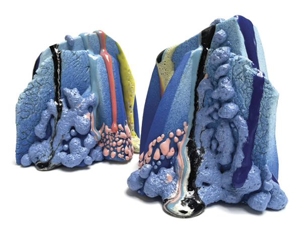 Mary Gattorna’s Set of Bookends (blue/pink/yellow), 6 in. (15.2 cm) in height (each), handbuilt stoneware, sprayed stained porcelain slip, underglaze, textural glazes, fired in oxidation to cone 6, 2025.