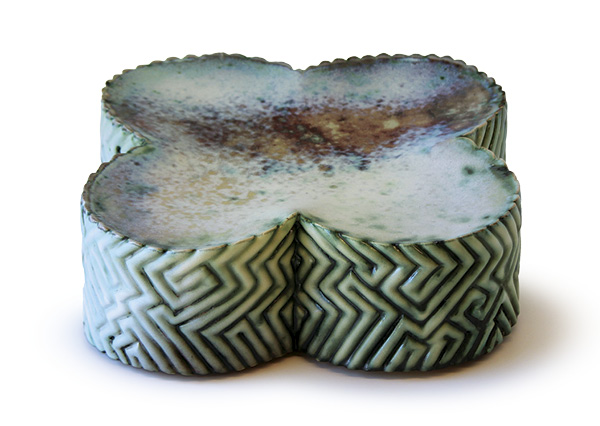 Karly Kennedy’s Rainbow Stripe Platform Platter, 15 in. (38 cm) in length, stoneware, glaze, copper oxide, fired to cone 8 in a soda kiln. Photo: Celia Feldberg.
