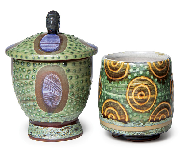 1 Ronan Peterson’s cup and jar, to 6 in. (15.2 cm) in height, red earthenware, terra sigillatas, glazes, fired to cone 03 in an electric kiln.