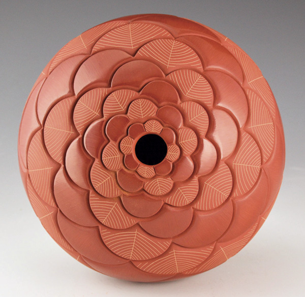 3 Stephanie Tafoya’s Ember Embrace, 7 in. (17.7 cm) in diameter, redware, 2025. National Museum of Women in the Arts, bequest of Sandra A. Kruzman; © King Galleries. Photo: Charles King.