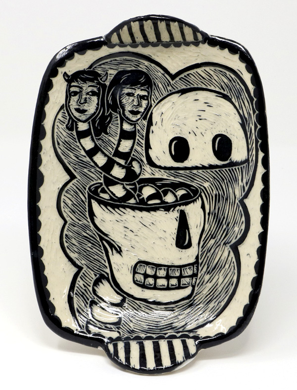1 Kathy King’s Split Head Tray Skull Plate, 10 in. (25.4 cm) in height, handbuilt white stoneware, underglaze, sgraffito, fired to cone 6. Photo: Silvia Palmer.