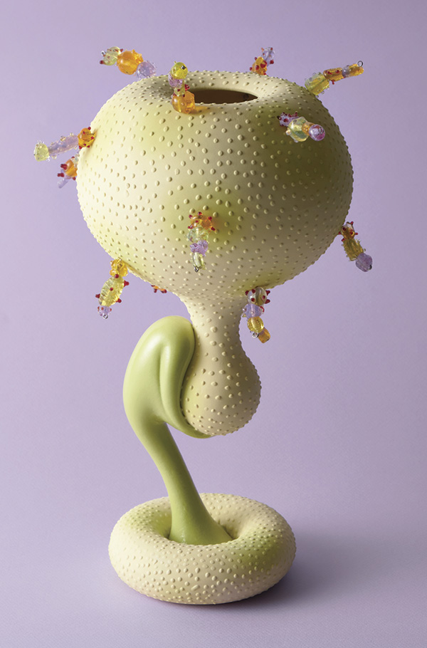 Salty Fairy Danji 11, 11 in. (28 cm) in height, porcelain, high-fire stain, gloop glaze, borosilicate glass, stainless steel wire, 2026. Photo: Karin Taylor and Chris Rands.