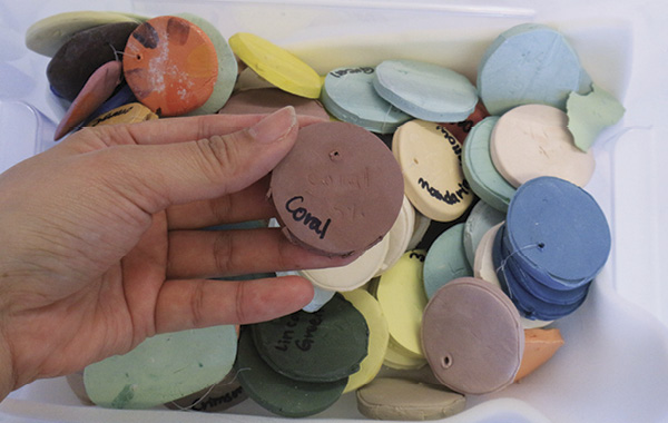 6 A box of porcelain slip color tests; for this piece, I selected a 5% coral stain.