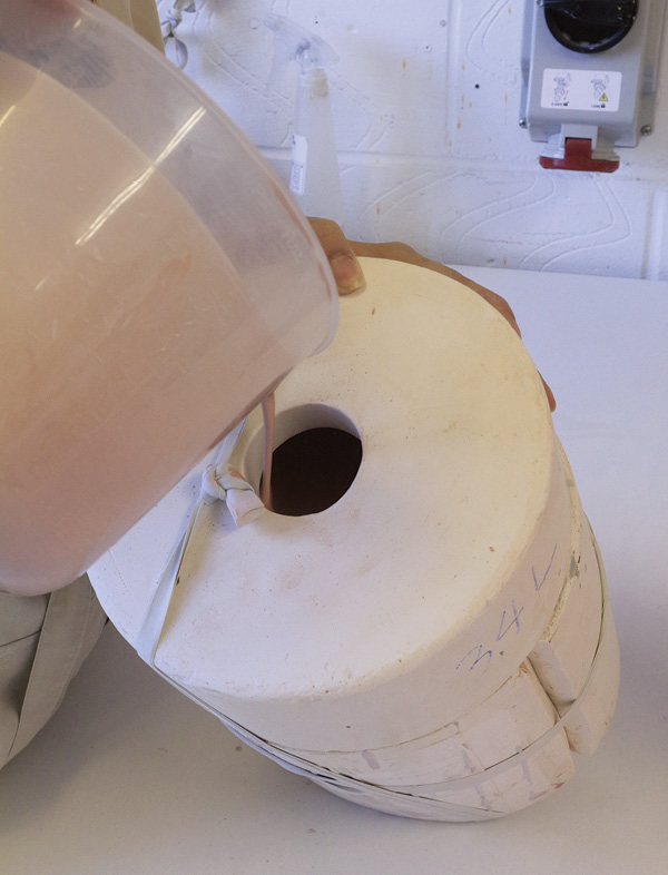 8 Tilt the mold while pouring the slip to prevent air bubbles from being trapped at the top.