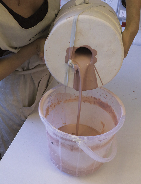 9 Pour out the slip from the mold. Leave the mold upside down to drain fully.