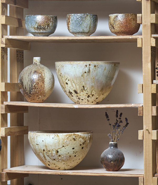 3 Studio shelves showcasing a selection of Haas’ finished ceramic works.