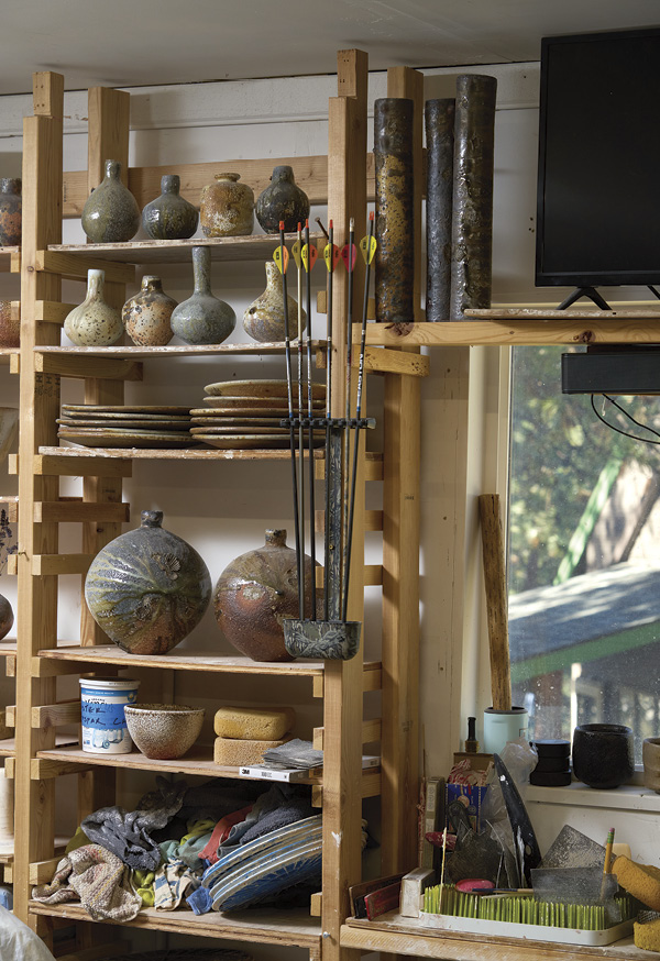9 In the studio, windows provide natural light and a view of the backyard.