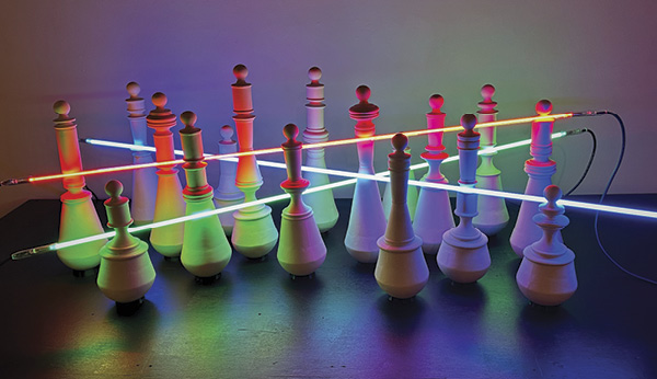 1 Sarah Blood’s We Will Not Go Gentle, to 3 ft. 9 in. (1.2 m) in height, unglazed vitreous ceramic, red, blue, and green neon, 3D-printed PVA, 2024.