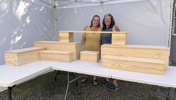 7 Kristin Schoonover (left) and Jen Allen (right) behind the complete Benyo Booth setup. Photo: Lisa Guiliani.