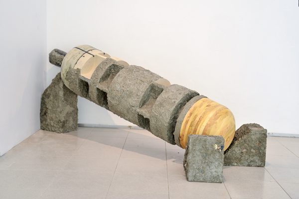  3 Anthony E. Stellaccio’s Lean, 5 ft. 6 in. (1.2 m) in length, clay, glaze, cement, wood, sand, fragments of Bethlehem separation wall. 