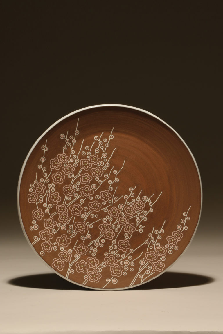 Wheel-thrown stoneware plate with inlay by Sumiko Takada.