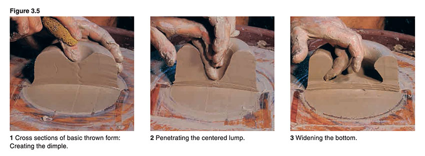 Image of opening a lump of clay on the pottery wheel.