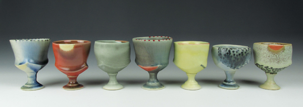 Deb Schwartzkopf’s liquor cups, wheel-thrown and altered porcelain, glaze.