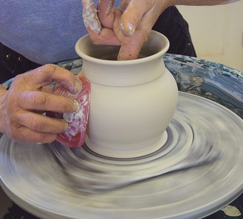 1 Throw a vase shape, create a flared rim then define the neck with a soft rib.