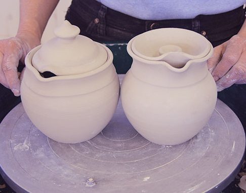 10 Two versions of the finished honey pot with dipper; one with a gallery inside of the rim on the pot and one without.