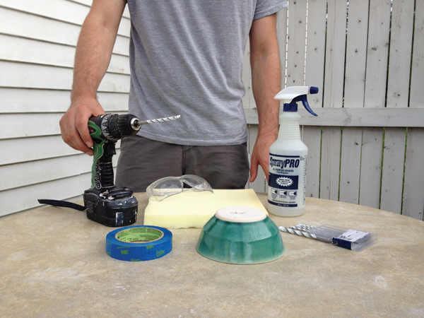 1 All the tools needed for drilling through fired ceramic: drill, carbide drill bits, tape, water bottle, safety glasses, foam, and ear protection (not pictured).