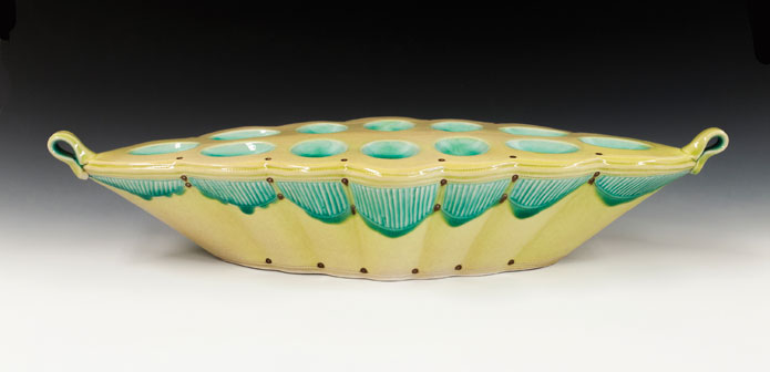 Dive into some ceramic chemistry today! The recipes used on this turquoise and yellow egg tray by Andrea Denniston are included below.