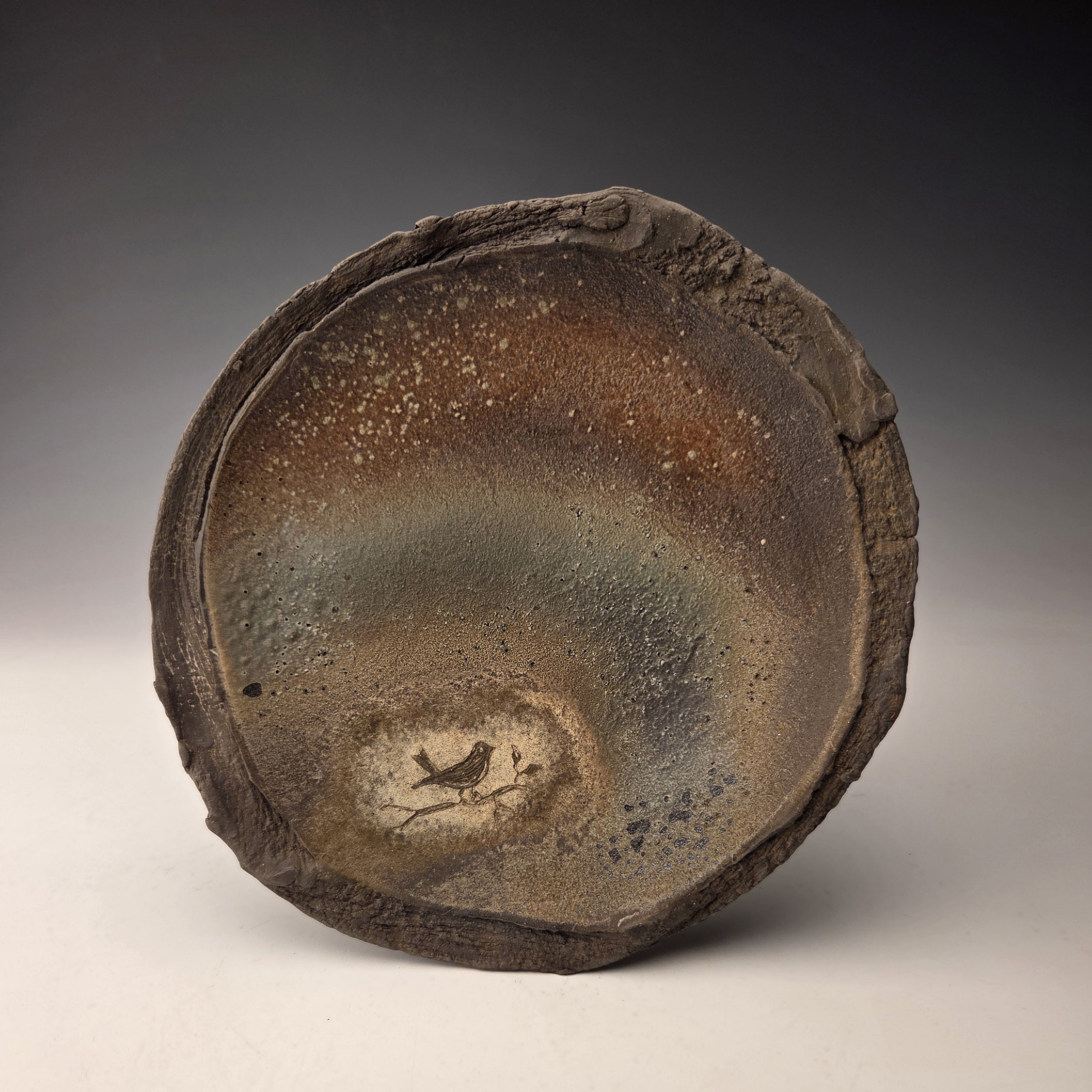 Photo of wood-fired ceramic plate by Shika Joshi, 51st Old Church Pottery Show Potter