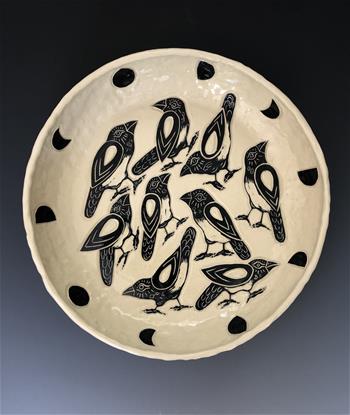 ceramic plate with multiple birds on the design