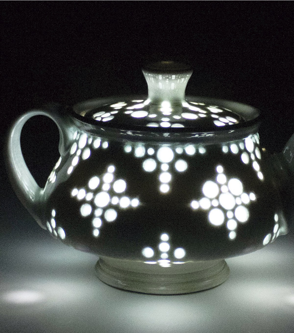 6 Rose Teapot, 6½ in. (16.5 cm) in height, porcelain, wheel-thrown, glaze-inlaid perforations, soda fired to cone 10, 2023.