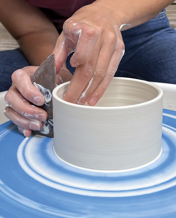 1 Begin by throwing and squaring off the 14 oz (397g) portion of clay.