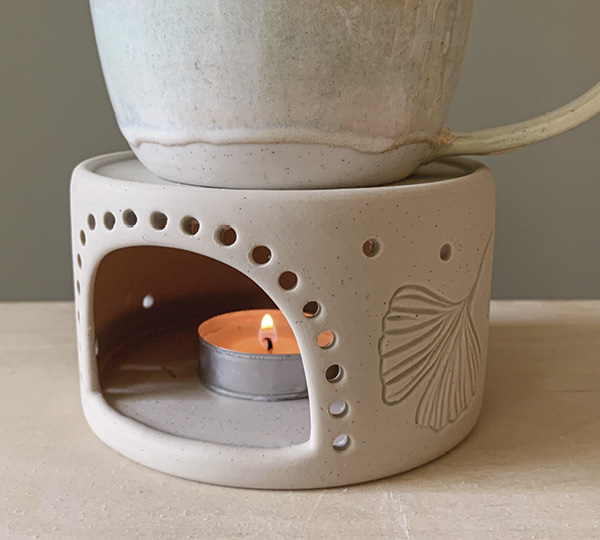 10 Test the mug warmer with a tealight while it’s leather hard to ensure there is sufficient airflow. Make more holes if needed.