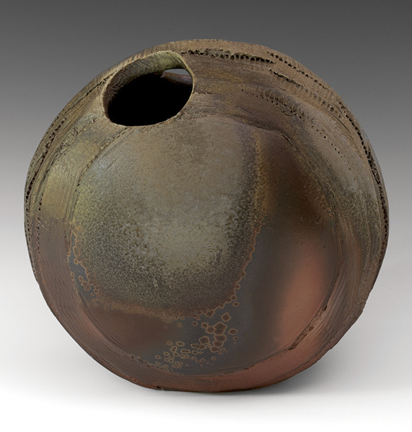 Flattened Moon Vase 2, 2023. Stoneware, natural-ash glaze, fired in an anagama to cone 10 to 13. Photo: Warren Frederick.