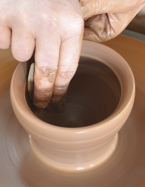 6 Shape the inside of the cup with the proper volume and slope.