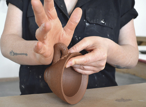 9 Using the bottommost part of your palm, create a broad surface and apply even pressure to create a solid attachment.