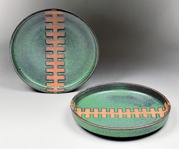 Industrial-inspired plates by Rebecca Sabo.