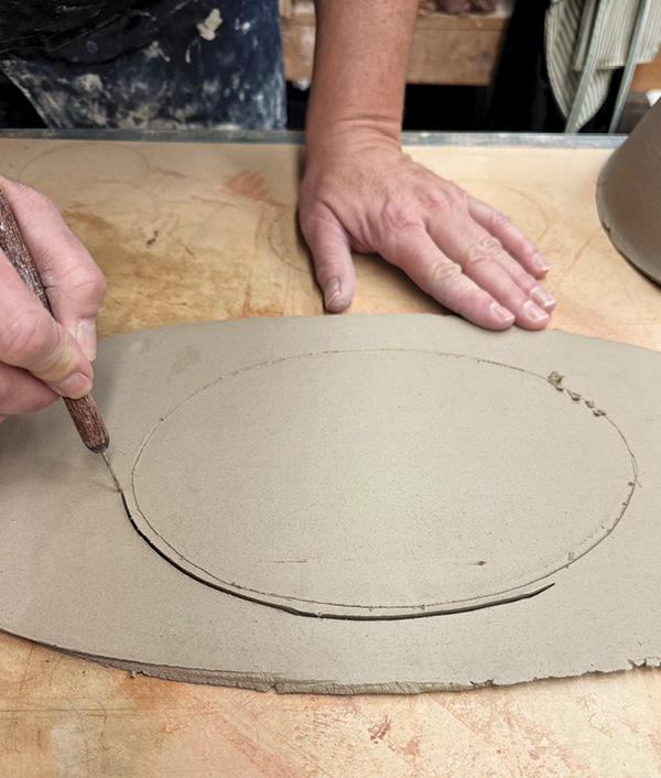 10 Cut out the base slab with your knife on the outside of your marked line by 1/4–1/2 inch (6.4-12.7 mm).