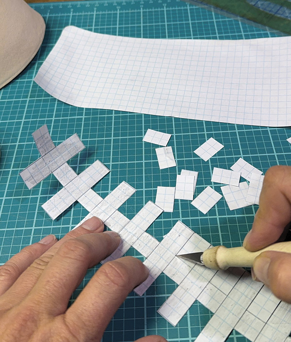 14 Using graph paper reinforced with clear tape, draw and cut out your pattern. Tape makes it durable and reusable.