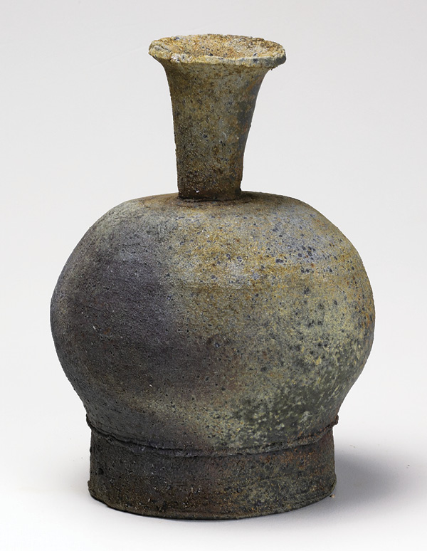 Footed bottle, 10 in. (25.5 cm) in height, iron-rich stoneware, natural ash glaze.