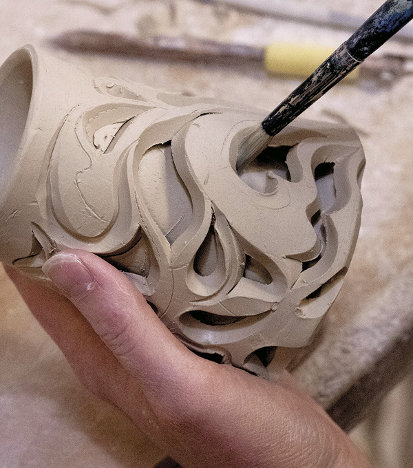 5 Wipe away the sketch lines. Use a brush to remove burrs, smooth seams, and soften transitions.