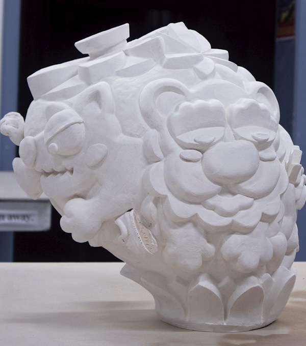 6 Brush white slip over the finished greenware. After bisque firing, glaze with multiple glazes or underglazes to finish.