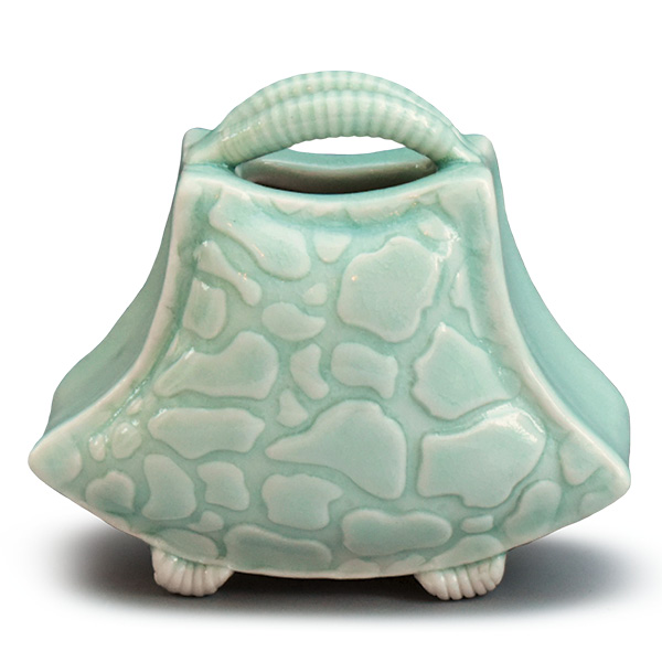 Rupa Palasamudram's Little Purse Pillow Vase, 5 in. (12.7 cm) in height, porcelain, fired in oxidation to cone 6, 2024.