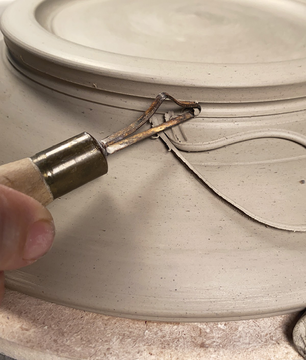 13 Trim a deep groove into the foot for a hanging wire.