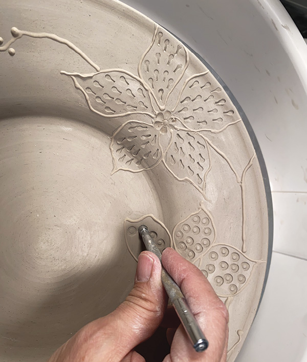 17 Use stamps to give each flower a distinct texture.