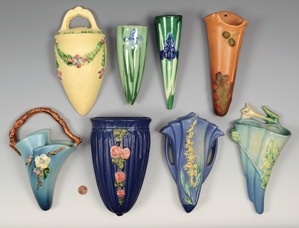 Vintage art pottery wall pockets, early 20th century by Roseville, Weller, and others. Photo: Courtesy of Case Auctions.