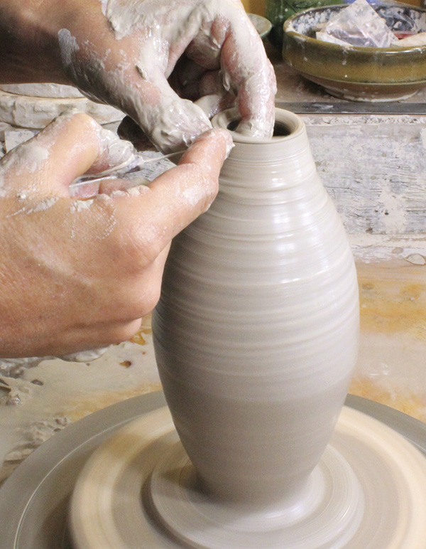 4 Use a needle tool to trim the rim back to flat between pulls.