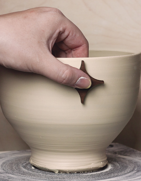 8 Use a single stamp to add a pattern all the way around the form.